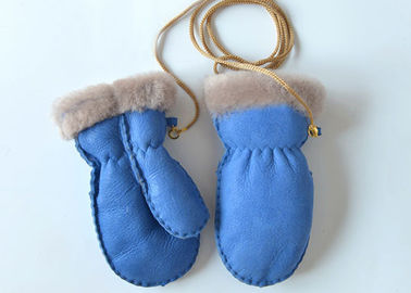 Porcellana Guanti genuini accoglienti caldi della pelle di pecora ragazze/dei neonati con il nastro per l'inverno fornitore