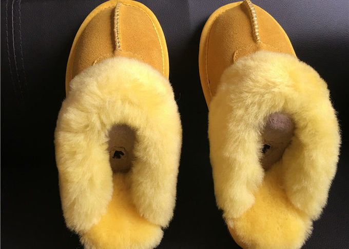 L'AUSTRALIA scherza le scarpe dell'interno calde dell'inverno della castagna delle pantofole della pelle di pecora